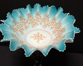 Antique Lovely Silver Plate Center Piece with Floral Painted Bowl. Lovely and intricately detailed. The silver plate pedestal stand by Meriden B. Company holds the ruffled edge bowl painted in a lovely aqua and gold design. Measures 12" h
