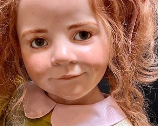 Loreli Wax over Porcelain Doll by Hildegard Günzel and Leo the Bear
Delightfully mischievous little girl with her partner in playfulness, handmade Günzel Bear, included as set. Loreli and Leo is an art doll by doll artist Hildegard Günzel. Loreli is made of wax over porcelain. Size of doll is 31 inches.
Loreli is an art doll by doll artist Hildegard Gunzel. Loreli is a wax over porcelain doll measuring 31 inches. Her partner, Leo is a handmade bear by Hildegard.
Loreli and Leo is a limited edition of 20. Handwritten on the back of Loreli is written, "artist proof"