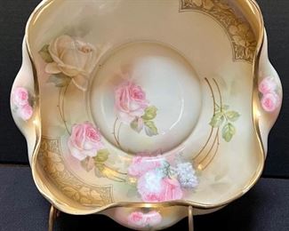 Beautiful Antique R.S. Prussia Bowl featuring a lovely floral painted design accented with a delightful scalloped/rippled gold painted edge.
Measures about 9.5".