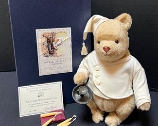 R. John Wright Night Time Winnie the Pooh Figurine with box and certificate and an adorable miniature felt bag with candles for his night time candle holder. There is some wax in the candle holder.
Number 170/2500.