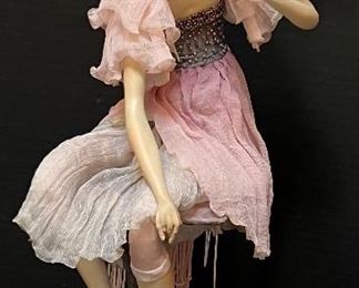 Tine Kamerbeek Doll Viola. Stone clay sculptured and seated on a one of a kind metal base. Measures about 15"