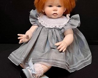 Ruth Treffeisen Doll- adorable with bright red hair and cute facial expression! Ruth Treffeisen is a porcelain German doll artist.
Measures about 20"
Number 72/90.
