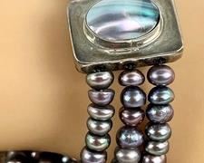 Triple Strand Pearl and Onyx Bracelet. Measures about 7” -7.5”