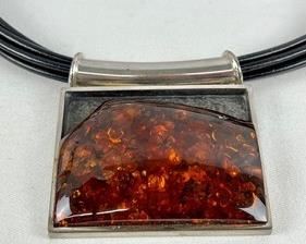Amazing Statement Piece Sterling and Amber Necklace by Amy Kahn Russell. Truly an amazing handcrafted piece!
Measures about 2.5” x 2.5”