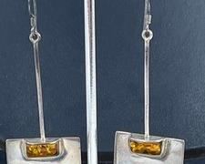 Pair of Sterling and Amber Earrings by Amy Kahn Russell.
Lovely pair of dangle earrings each measuring 2”