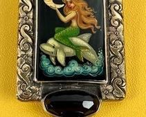 Amy Kahn Russell Gorgeous Pendant featuring a mermaid and gemstones. Can be used as a pendant or a brooch.
Measures 2.5