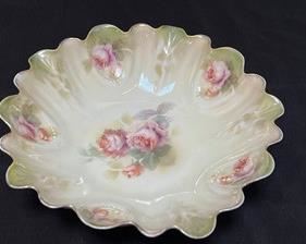 Assortment of Lovely Vintage China Items including a bowl, platters, salt and pepper set, cream/sugar set and more. The largest plate in this lot measures at 10.5”.