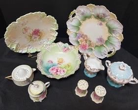 Assortment of Lovely Vintage China Items including a bowl, platters, salt and pepper set, cream/sugar set and more. The largest plate in this lot measures at 10.5”.
