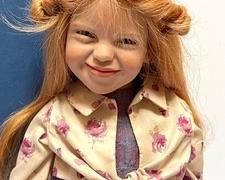 Zwergnase Doll Lille - measuring about 21".
Lille has beautiful long red hair which accents her freckled face! She has an adorable facial expression and features glass eyes.
Lille was limited to 250 worldwide.
Comes with box.