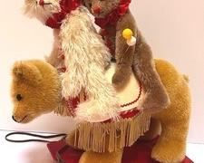 Adorable Vintage Bear on Rolling Cart with Two Artisan Clown Bears. Cute combination!
The wooden base on the rolling cart has some wear and the wheels on the base were bent back into shape.
The bears are by Muriel.