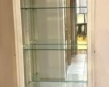 Lighted Display Cabinet - nice sleek modern design with white washed finish.
Measures 36" x 15" x 78"
The sides open and feature a lock/key.