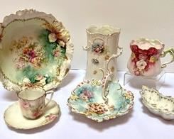 Beautiful Antique China Items in lovely floral patterns. Items in vintage condition with light wear which may include paint loss and the demitasse teacup does have a chip in the rim.
The bowl measures 8.5" x 2"
Some items may be unmarked RS Prussia.