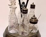Antique Lovely Cruet Set - in very good/vintage condition with beautiful etched glassware pieces.
Measures 17" h