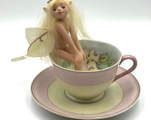 Teacup Fairy Art Doll
Adorable Elf Fairy Figurine on a Teacup. She is so adorable! No maker’s mark found
Part of her wings needs to be re-glued.