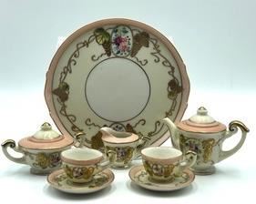 Vintage Doll Tea Set. Made in Occupied Japan.
Adorable with lovely details and design! The tray measures about 4.75"