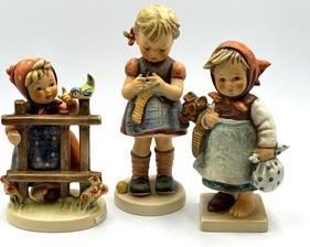 Three Hummel Figurines; Hummel Figurine Signs of Spring, Hummel Figurine Stitch in Time, Hummel Figure Weary Wanderer. These figurines may have some crazing. Measuring about 5” to 6” each
