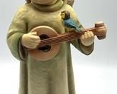 Hummel Figurine Festival Harmony measuring about 10.2"
Marked 172/II