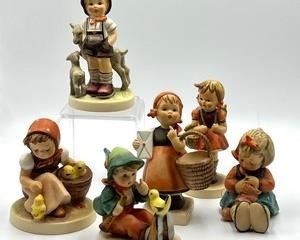 Collection of Six Hummel Figurines including;
School Girl
Knit One, Purl One (measuring about 3")
Meditation (measuring about 4.5")
Little Goad Herder
Chic Girl
Singing Lessons