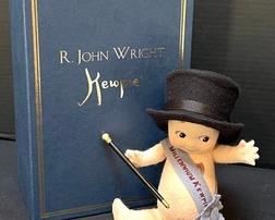 R. John Wright Millennium Kewpie Doll with box and certificate
Number 97/500
Nccame: Millennium Kewpie Doll
Description: 7", wool felt, fully jointed.
Date of Release: 2000