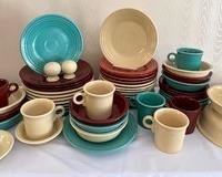 Fiesta Dinnerware in five different colors. Set in good condition with light wear. Varying degrees of wear.