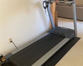 Precor Treadmill, excellent condition, includes floor mat. 