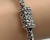 A by JH Sterling and 14k Bracelet - 7"
John Hardy