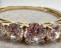 14k and Cubic Zirconia Ring with a sparkling and dazzling appearance!
Size 9