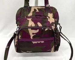 Lovely Lug Purple Camo Canter Backpack/Handbag measuring 13x11x4.5 inches. The backpack straps fit neatly in a pocket in the back fully hiding them for a handbag look.