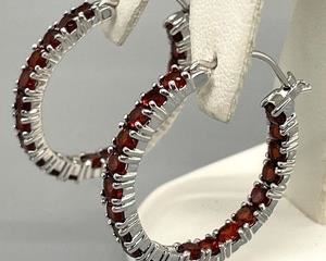 Sterling Silver and Garnet Hoop Earrings that measure 1 inch in diameter. Radiant red garnets!