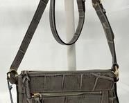 This New with Tags Dooney & Bourke Allison Crossbody Handbag with Dust Bag is in the color of Smoke and measures 9x4x8.5 inches. Very stylish looking handbag!