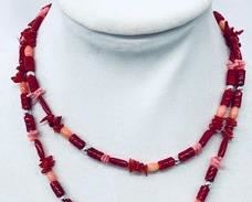 Sterling Silver Necklace with Tiger Eye Beads that measures 22-25 inches long.
