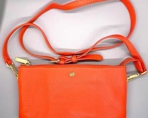 Great organizational inside! This Outstanding Orange G.I.L.I. Crossbody Handbag measures 5.5x9.5 inches. Perfect accent color to enhance your outfit!
