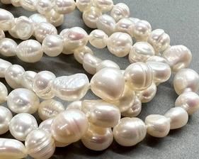 eautiful Strand of Freshwater Pearls - measuring 56". Wear long or double up for a different look!