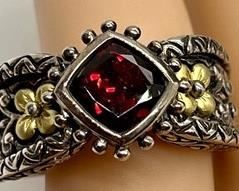 Gorgeous Barbara Bixby Garnet, 18k, and Sterling Ring.
A Beautiful Barbara Bixby Sterling Silver 18 Karat Gold Highlight Floral Accent Garnet Ring
Size 9