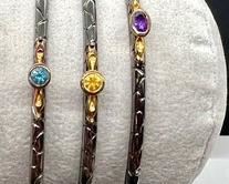 Three Sterling Silver & Multi Stone Bangle Bracelets In very good condition.