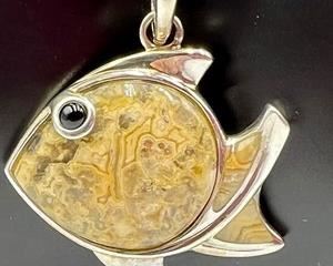 Agate, Onyx and Sterling Fish Pendant by Whitney Kelly on a silk cord.