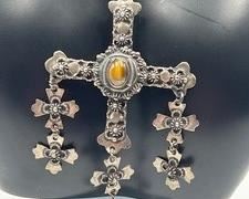 Sterling Silver Cross Necklace with the chain measuring 19" and the cross 3.25"
Looks similar to a necklace by JCB. The hallmarks can be seen in the photos.