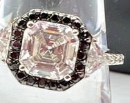 Dazzling Cubic Zirconia and Sterling Ring - it truly sparkles and shines! WOW!
Size 9. Appears to be in new condition.