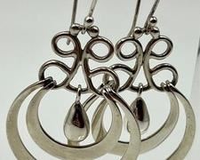 Unique Designed Sterling Silver Earrings - appear to her in new condition. Measuring about 2"