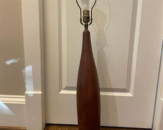 $440 - Tall Danish Mid Century Modern Turned Teak Lamp by ESA SK92-23                                                                            Description:  1960s sculptural turned teak Danish lamp by ESA. Features a counterweighted base to better support the tall form. Retains the brass insert on the underside bearing the 'ESA, Made in Denmark' manufacturer's mark.
Condition: Very good.  Some marks consistent with ag.
Dimensions: Teak base height: 23" Height to top of socket: 26.5" Height to top of harp: 36.35" Base diameter: 4.25".
Local pick up Bethesda, MD.  Contact us for shipper suggestions
Dimensions:
Length: 4.25"
Width: 4.25"
Height: 24"
Pick up location: 20817 https://goodbyhello.com/products/tall-danish-mid-century-modern-turned-teak-lamp-by-esa-sk92