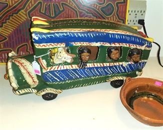 A ceramic Mexican folk art bus