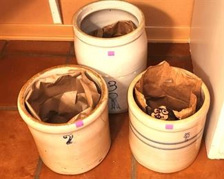 Crocks used as trash cans! 