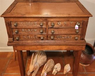 An antique Clark's spool and thread  cabinet with desk top on stand