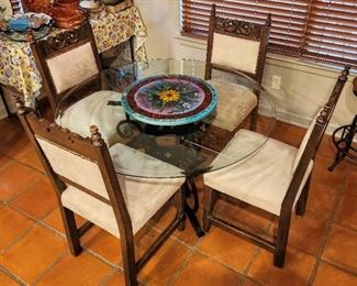 Spanish style round glass top dining table