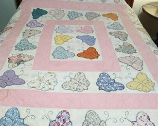 Butterfly quilt and antique quwwn bed