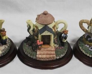 2471 - 3 Resin Teapot Figure Houses each 4" tall
