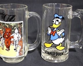 2575 - 2 Collector glass mugs 6 1/2"
