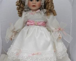 2683 - Seymour Mann Porcelain doll - 22"
