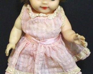 2927 - Vintage doll with stand
