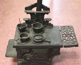 137x - Mini Cast Iron Cresent Oven w/ Cauldrons 11 1/2" tall
